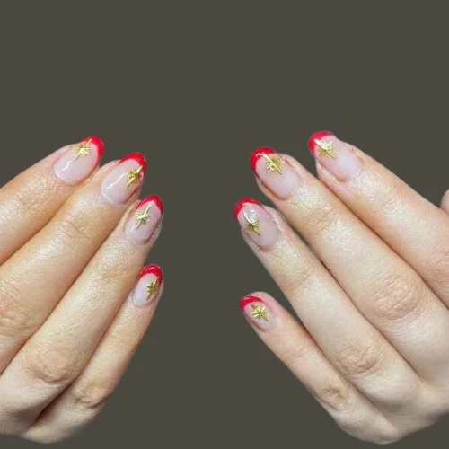 girls nail having Crystals on Red Tips